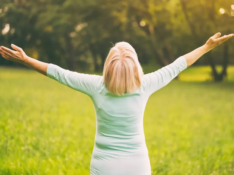 Woman with arms up