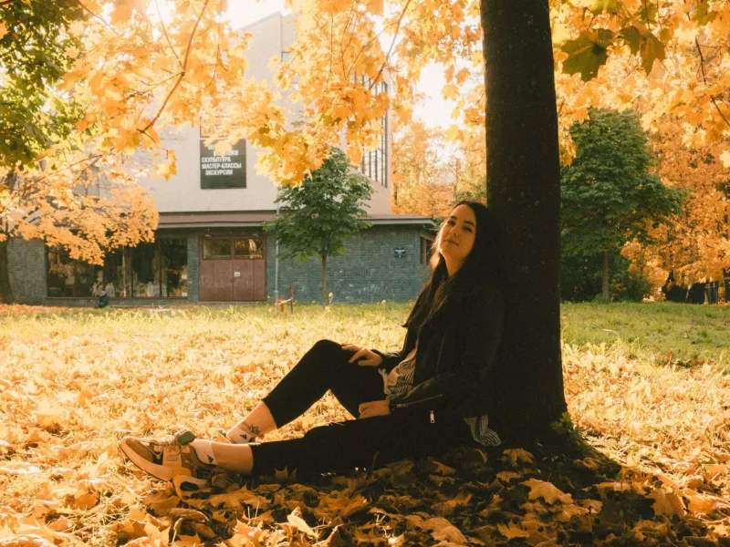 Woman under a tree
